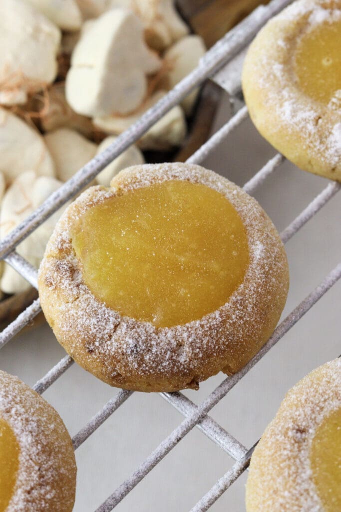 A delicious lemon baobab thumbprint cookies on a cooling rack